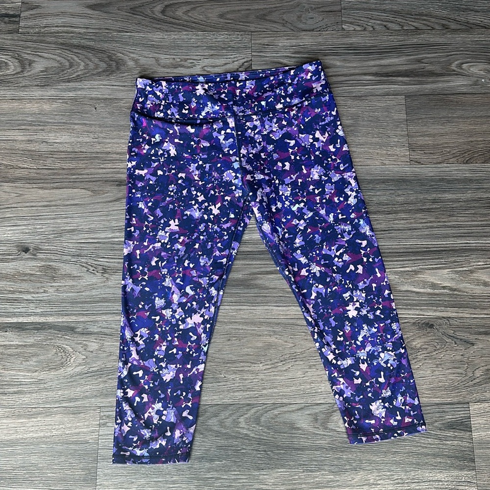 Fabletics purple Camo Flurry Print Power-Hold Mid-rise capri leggings - large